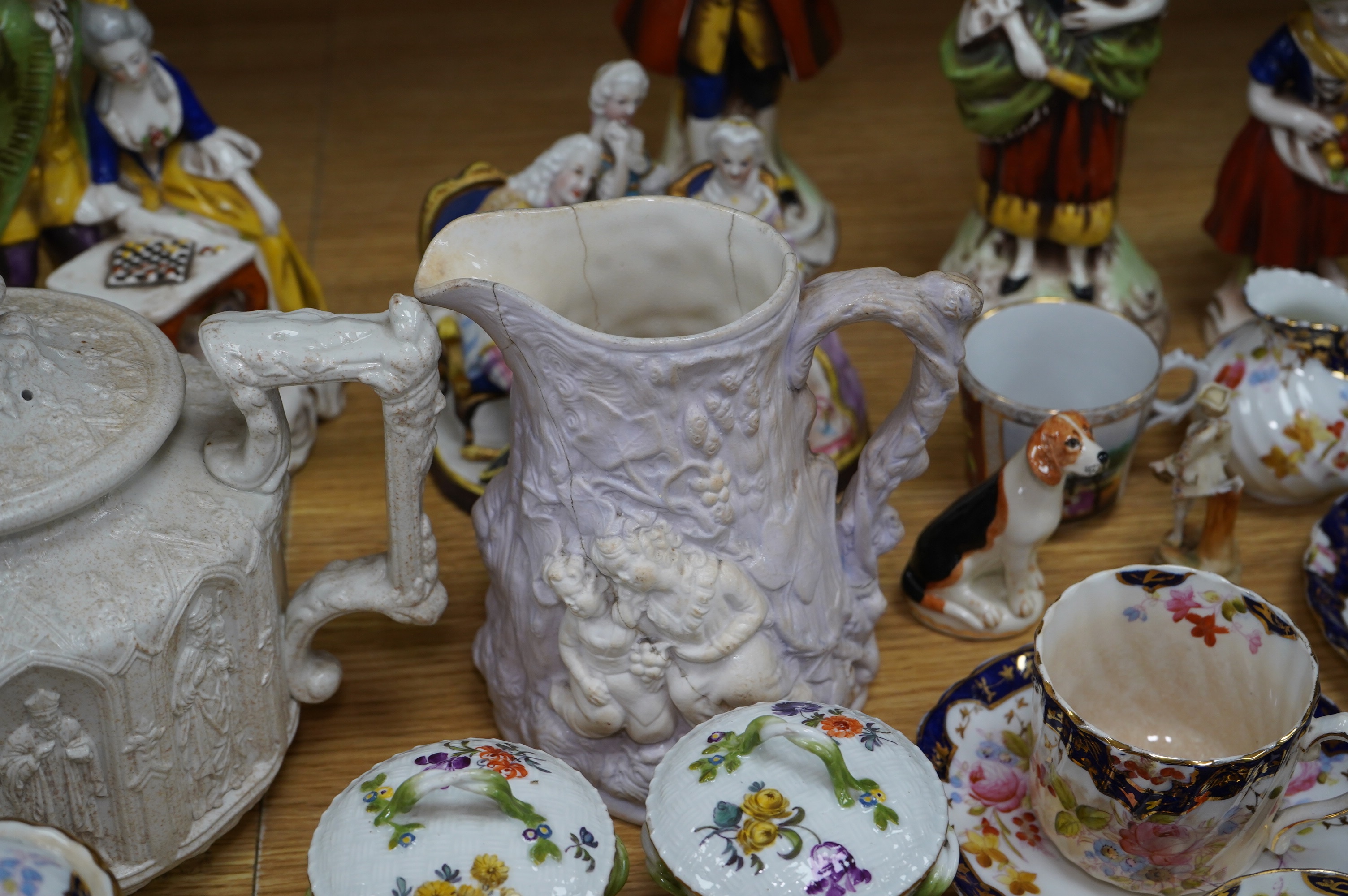 A quantity of 19th and early 20th century ceramics including two chess playing groups, four further Continental figures, a copy of a Meigh teapot, three cups and saucers, two Meissen pots and covers, etc. Condition - var